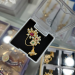 Royal-Gold-Finish-Pearl-Nath-with-Ruby-Emerald-–-Wedding-Nose-Ring